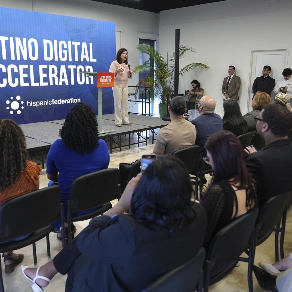 Latino workers working to overcome a technological divide brought on by automation, AI